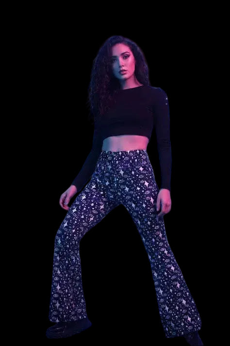 Navy blue bell bottom pants with white celestial eye and star constellation print